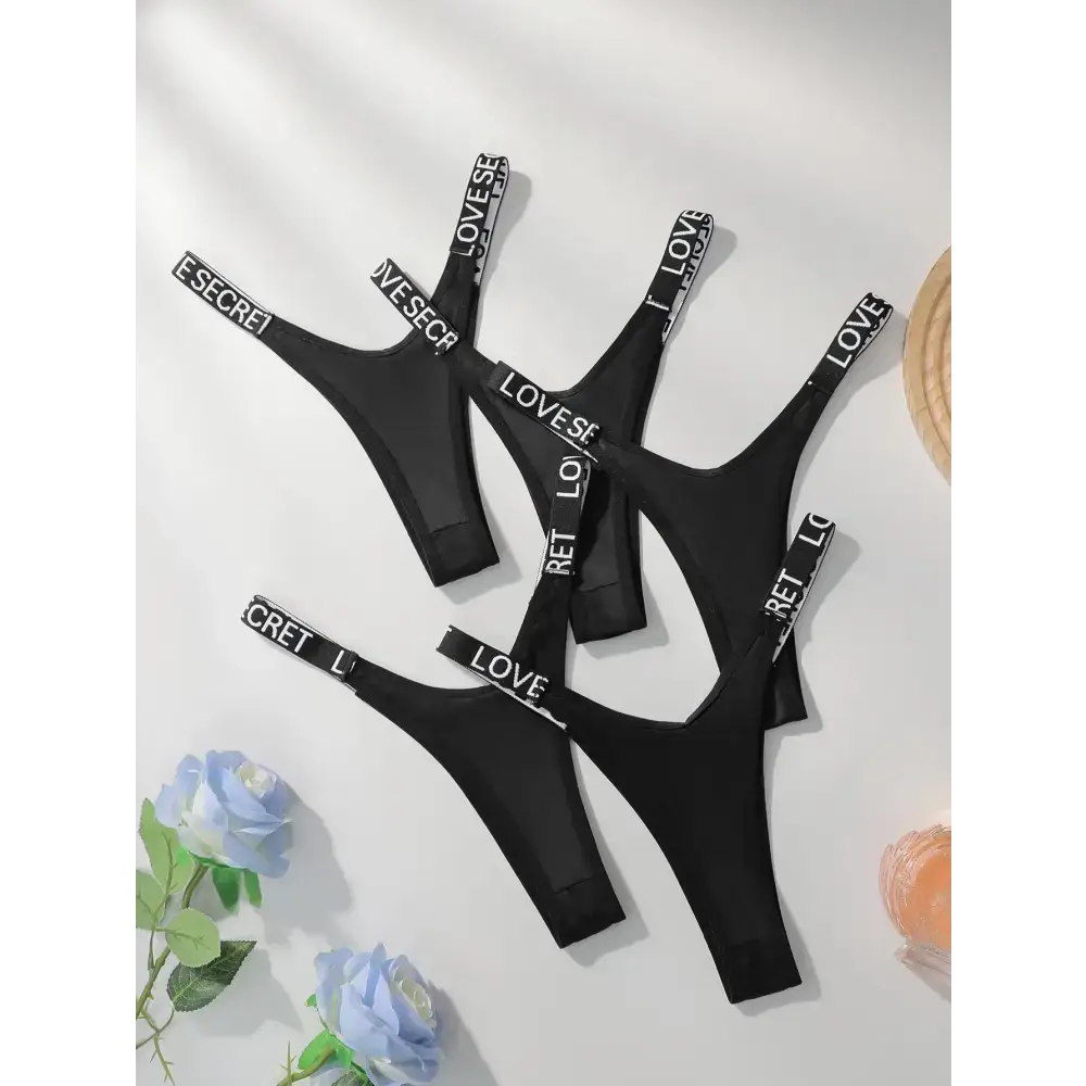 The Lady's Haven Boutique black comfortable thong pack with white logo elastic waistbands