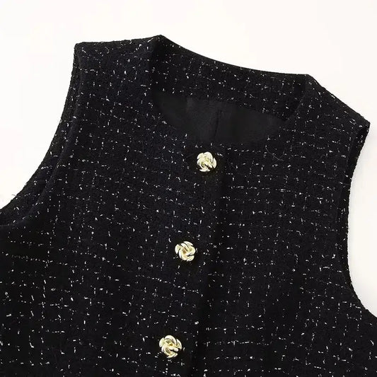 Black textured cropped vest and high waist shorts set with gold buttons from The Lady's Haven Boutique