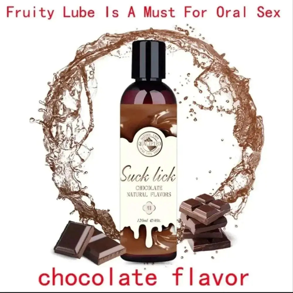 Suck lick Chocolate flavored lubricant in a bottle, surrounded by chocolate pieces and a chocolate splash.