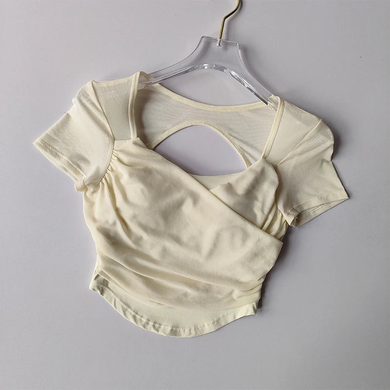 Cream Padded Yoga Shirts for Women with Stylish Open Back Design for Comfort and Flexibility
