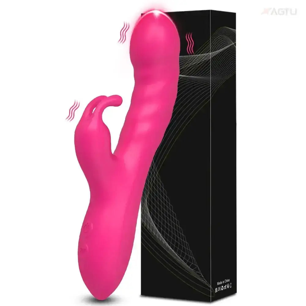 Pink rabbit vibrator with clitoral stimulator and packaging. Adult sex toy for G-spot stimulation.