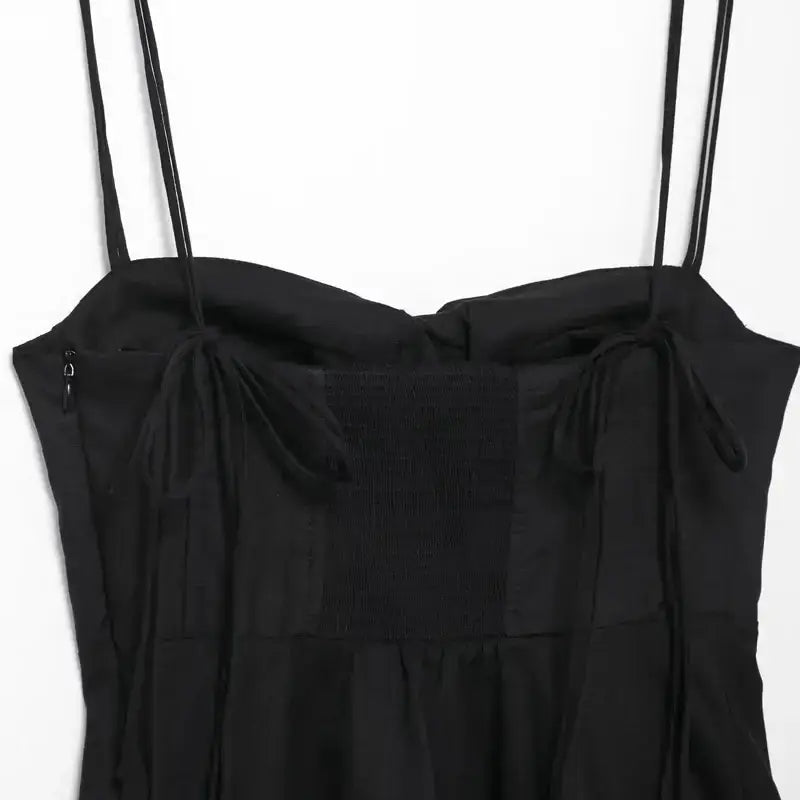Black sexy bow backless slip top with thin straps and ruched detailing by The Lady's Haven Boutique