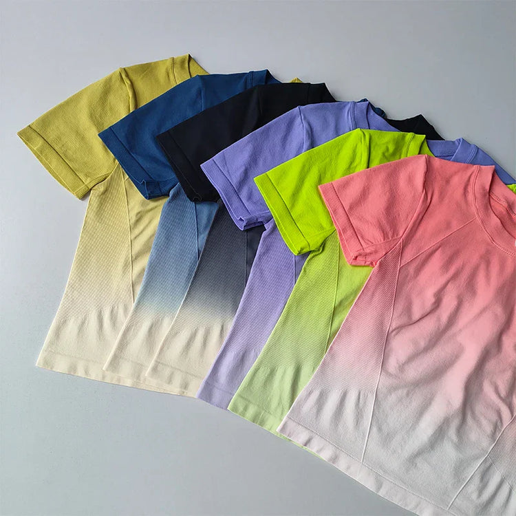 Collection of stylish yoga shirts in various colors and gradients for comfortable workouts