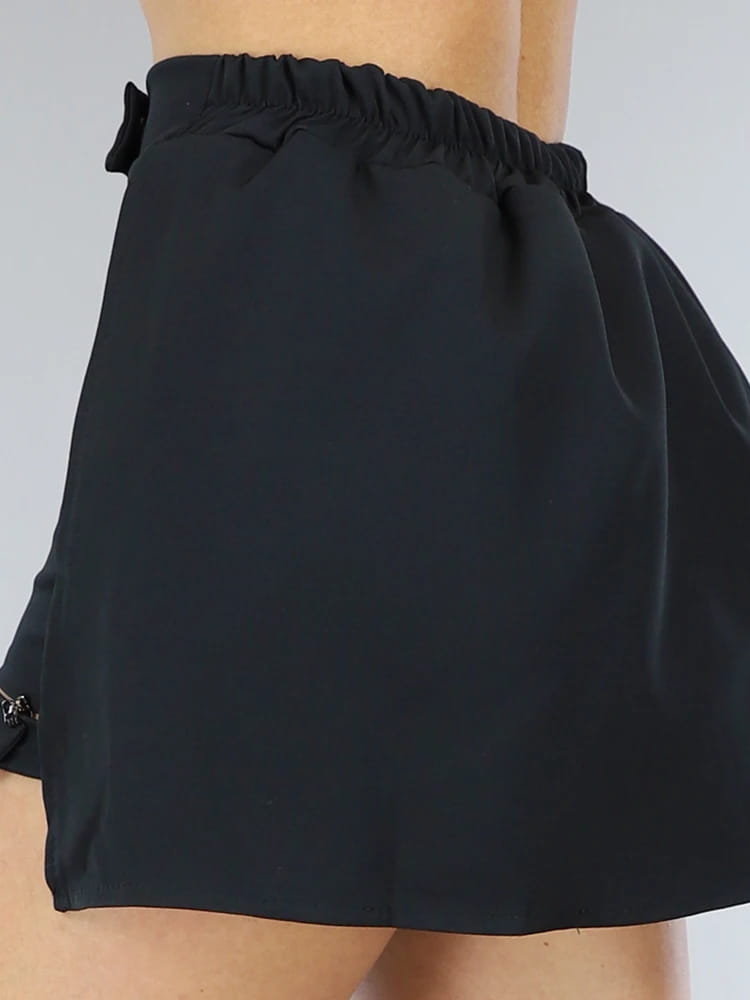 Falda acampanada de talla grande para primavera y verano de 2024, minifalda informal negra versátil a la moda para mujer, plisada y esponjosa corta