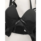Black lace bra with adjustable shoulder strap lingerie featuring a small front bow detail
