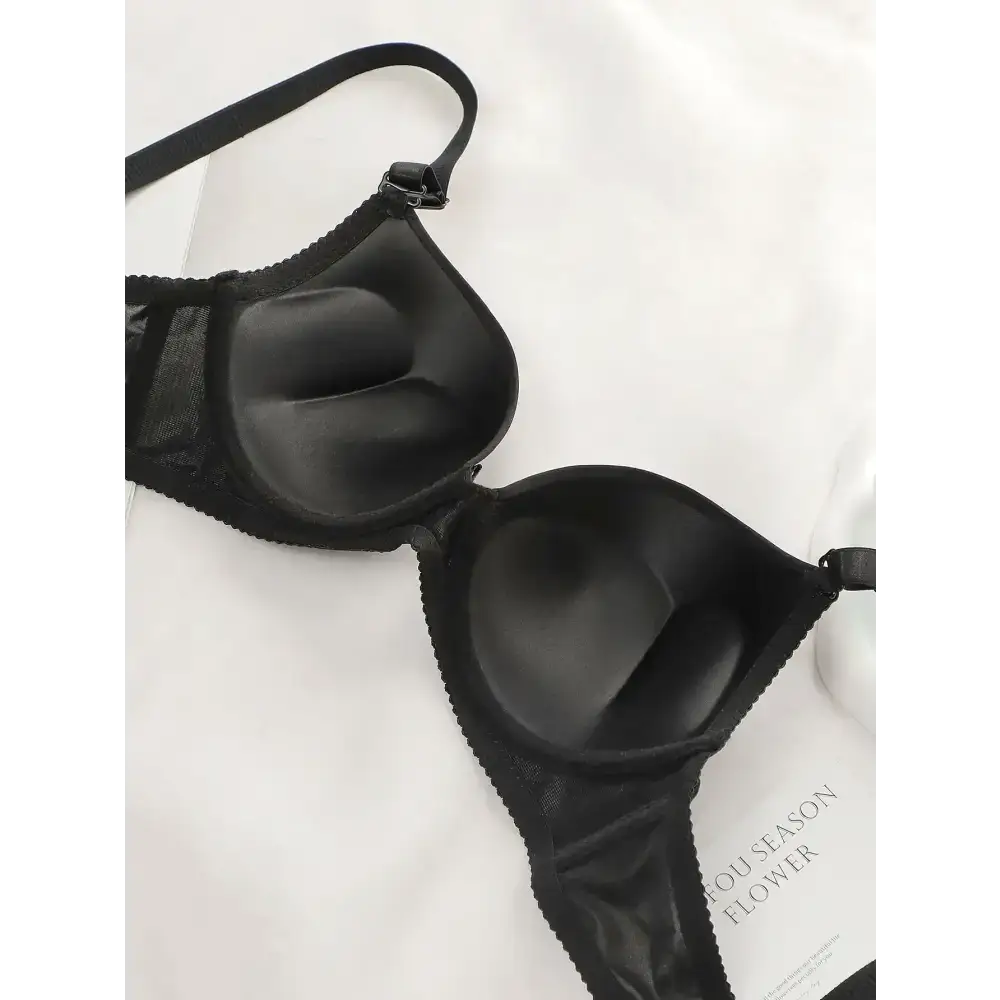 Black adjustable shoulder strap lingerie with molded cups and lace detailing from The Lady's Haven Boutique