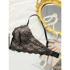 Black adjustable strap lace bra for women with intricate floral lace design and hook closure