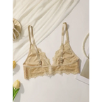 Beige lace adjustable strap wireless bra laid flat with decorative pearls and flowers