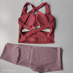 2 piece workout outfit featuring a cross-back sports bra and matching leggings in mauve