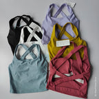 Colorful collection of tank tops showcasing a 2 piece workout outfit perfect for fitness enthusiasts