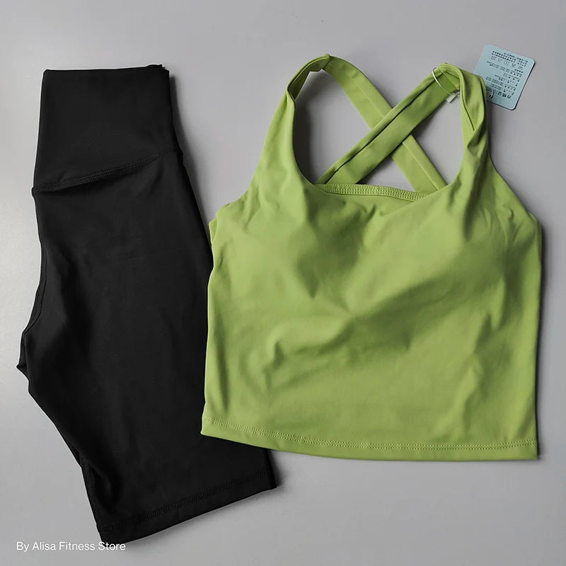Ladies sports bra and shorts set in green and black for comfortable workouts at The Lady's Haven Boutique