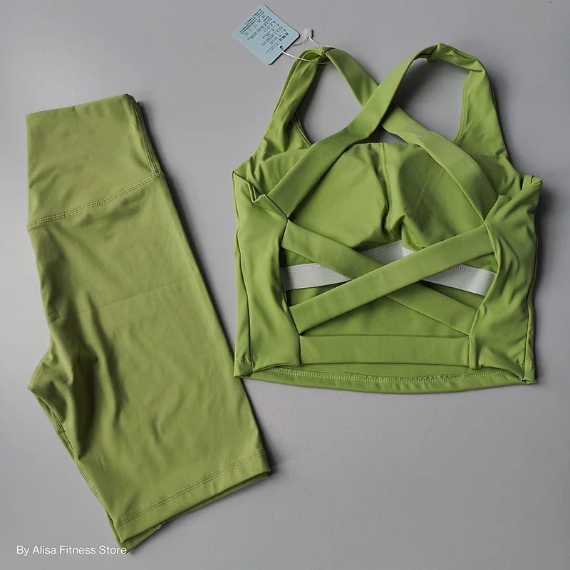 Lime green ladies sports bra and shorts set with crisscross back design for active workouts