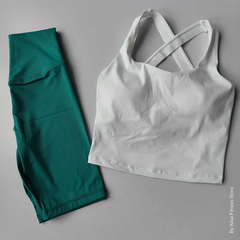 Stylish ladies sports bra and shorts set in white and teal for active women