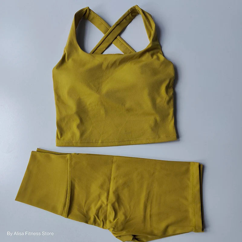 Ladies sports bra and shorts set in mustard yellow for comfortable workouts and active wear