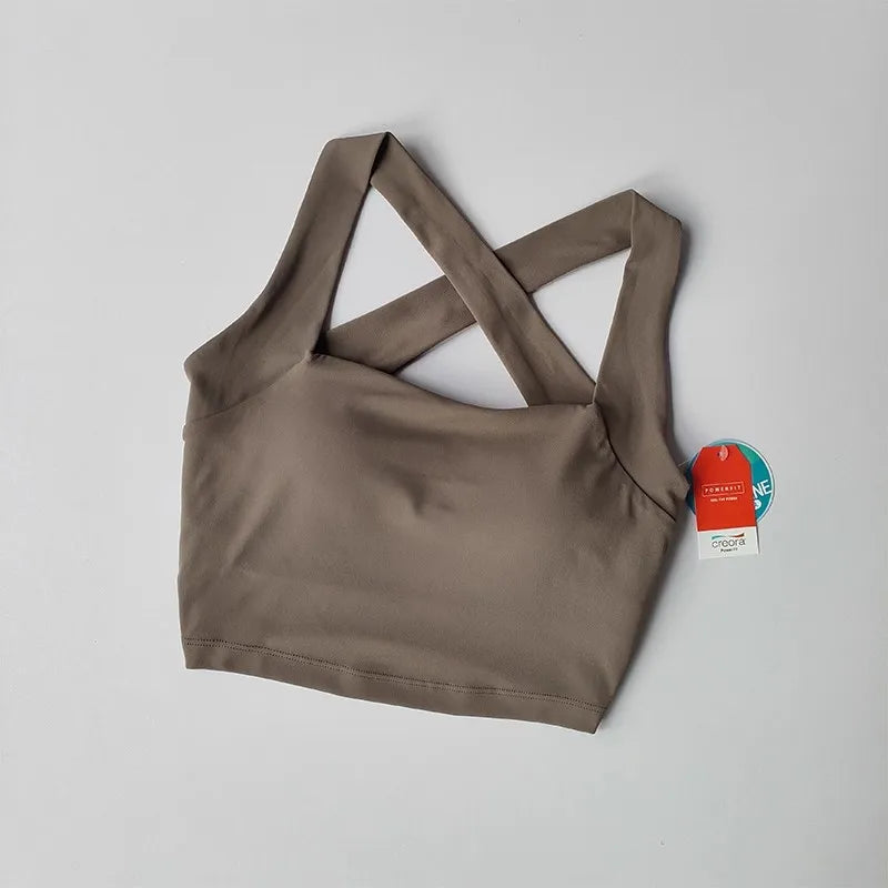 Stylish beauty back yoga bra in taupe with crisscross straps for comfortable support during workouts