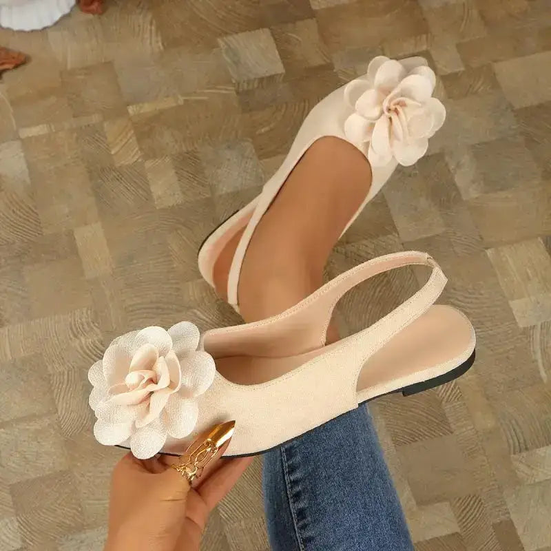 Beige flat heel sandals with big flower embellished sandals detail perfect for casual wear