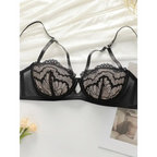 Black lace low waisted thong bra set with delicate floral patterns and adjustable straps