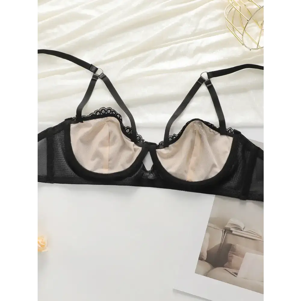 Black and beige low waisted thong bra set with lace trim and adjustable straps from The Lady's Haven Boutique