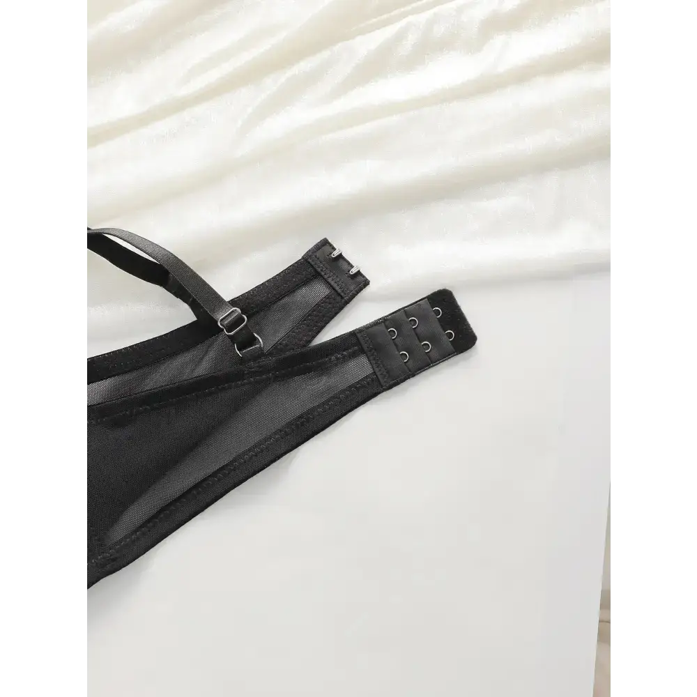 Black low waisted thong bra set with adjustable straps and hook closure from The Lady's Haven Boutique