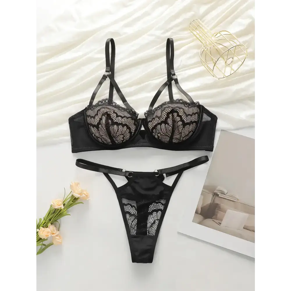 Black lace low waisted thong bra set from The Lady's Haven Boutique with adjustable straps