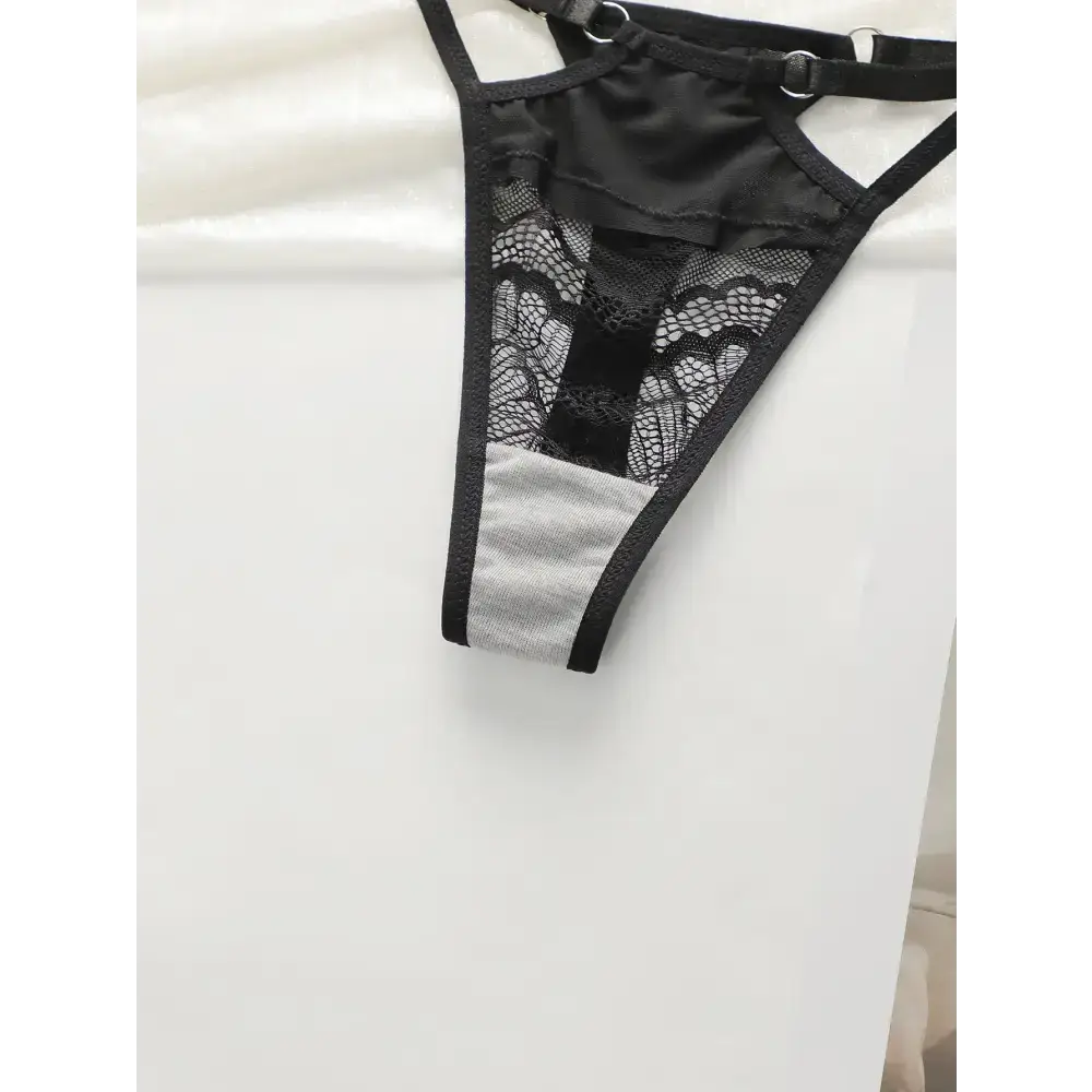 Black lace low waisted thong bra set from The Lady's Haven Boutique with intricate detailing