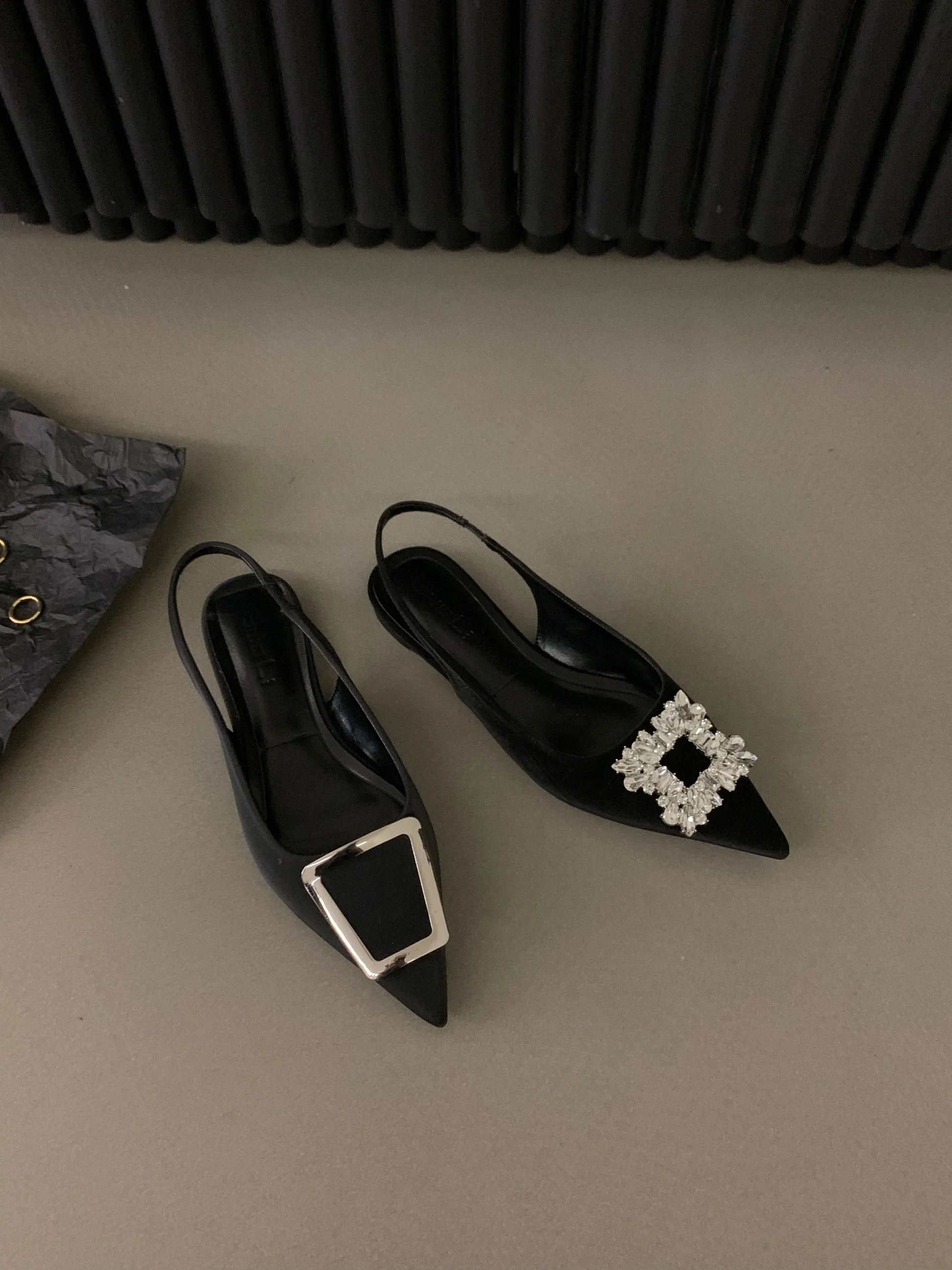 Black pointed toe mid heel sandals with decorative buckles from The Lady's Haven Boutique