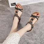Bohemian beaded summer sandals flat heel sandals with decorative beads and black straps from The Lady's Haven Boutique