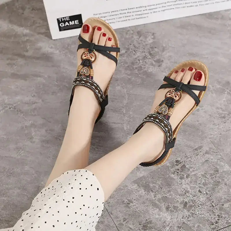 Bohemian beaded summer sandals flat heel sandals with decorative beads and black straps from The Lady's Haven Boutique