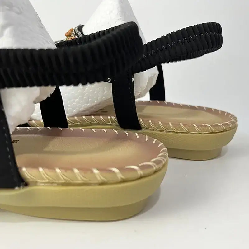 The Lady's Haven Boutique flat heel black bohemian beaded summer sandals with stitched sole detail