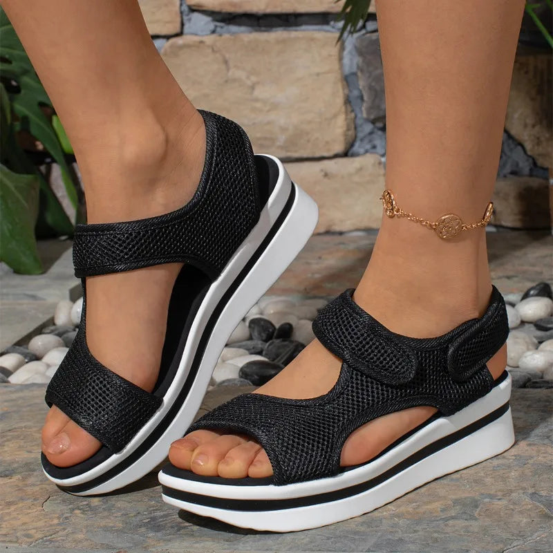 Black mesh platform sandals with adjustable straps and white thick sole from The Lady's Haven Boutique