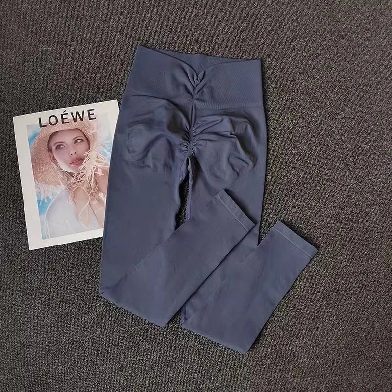 Navy breathable gym leggings with a high waistband for comfort during workouts