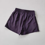 Breathable gym shorts for women in purple with a comfortable waistband and mesh panels