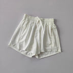 White breathable gym shorts for women with mesh side panels for optimal comfort and airflow