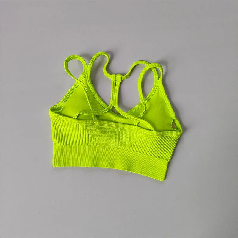 Bright yellow breathable sports bra for women with a stylish racerback design