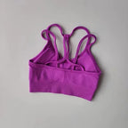 Purple breathable sports bra for women with stylish crisscross back design