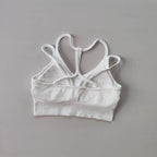 White breathable sports bra for women with crisscross back design for added support