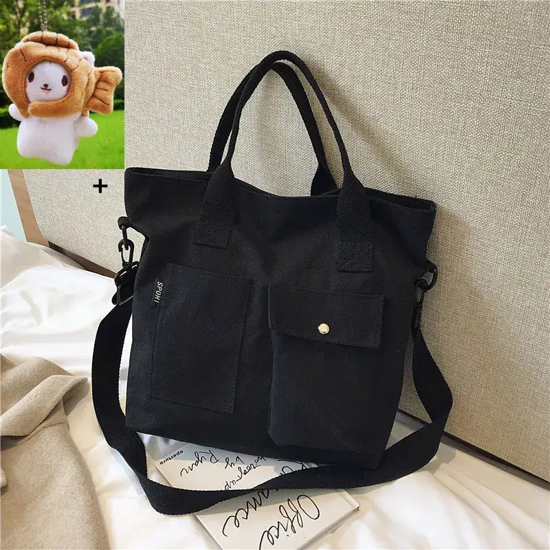 Stylish black casual canvas tote bag for women with multiple pockets for everyday use