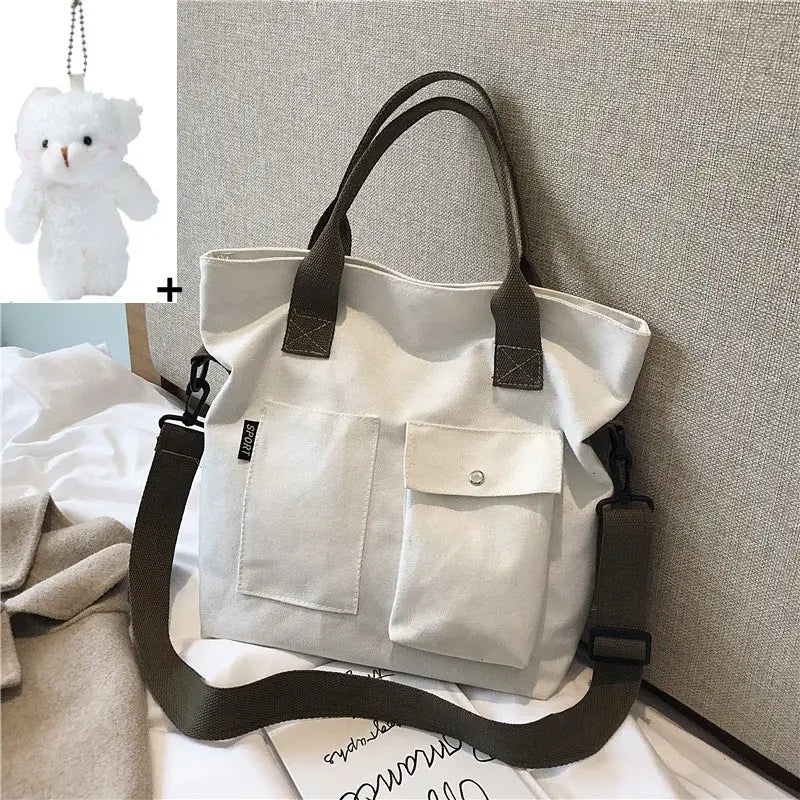 Stylish casual canvas tote bag for women with shoulder strap and front pockets for versatile use