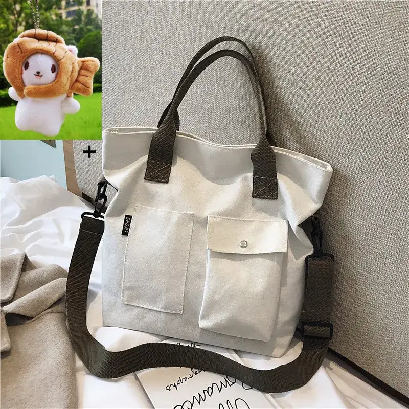 Stylish casual canvas tote bag for women with sturdy straps and front pockets for easy access