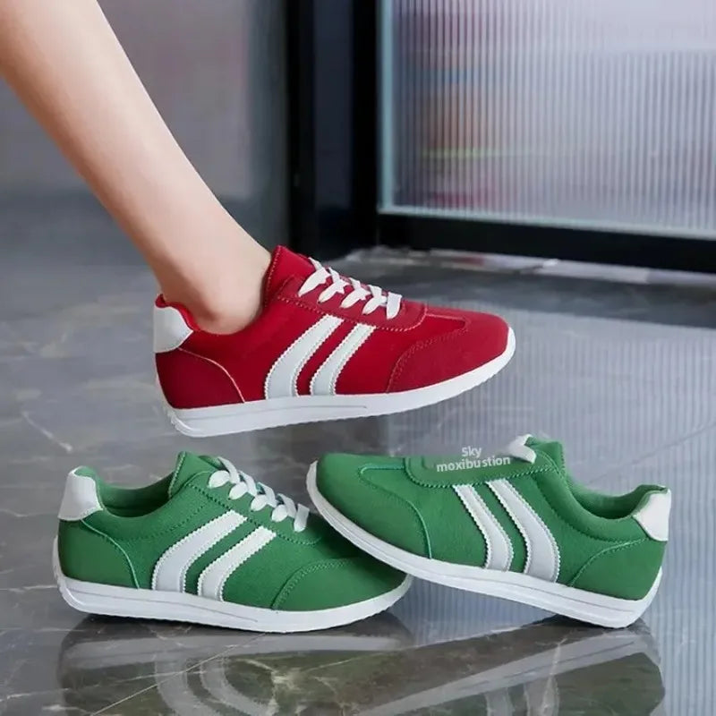 The Lady's Haven Boutique casual slip on sneakers in red and green with white stripes and laces