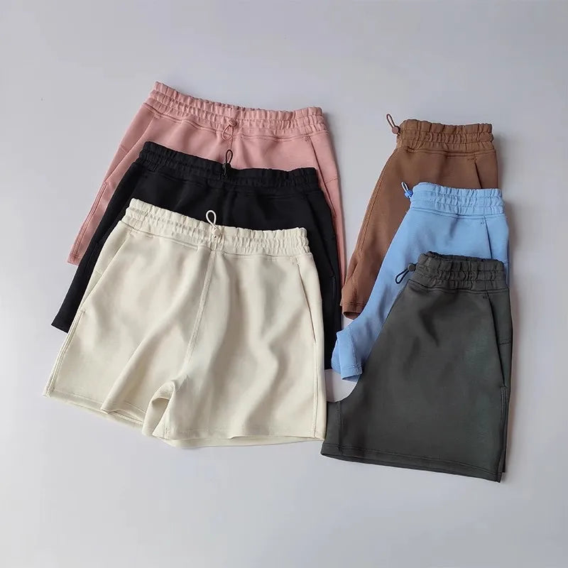 Casual Sports Shorts for Women in various colors including black, pink, blue, and beige