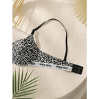 Leopard print push up bra in black and white with adjustable straps and hook-and-eye closure