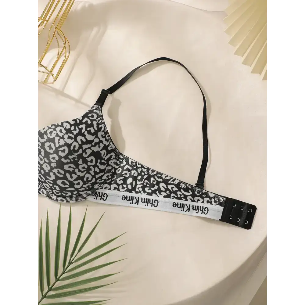 Leopard print push up bra in black and white with adjustable straps and hook-and-eye closure
