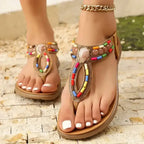 Colorful bohemian beaded sandals flat heel sandals from The Lady's Haven Boutique with vibrant beads and ankle chain detail
