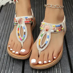 Colorful bohemian beaded sandals flat heel sandals from The Lady's Haven Boutique on feet with white nail polish