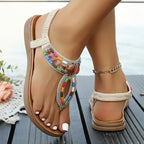 Colorful bohemian beaded sandals flat heel design by The Lady's Haven Boutique on feet