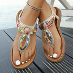 The Lady's Haven Boutique colorful bohemian beaded sandals flat heel with multicolor beads on wooden deck
