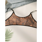 Comfortable animal print lingerie bralette with black trim straps laid flat on a white surface
