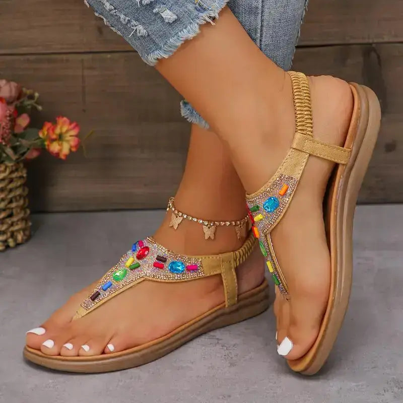 Comfortable flat beach flip flops with colorful gems and elastic straps from The Lady's Haven Boutique