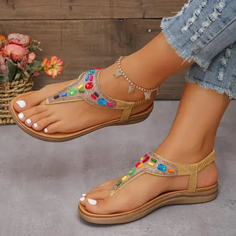 Comfortable flat beach flip flops with colorful gemstone detailing from The Lady's Haven Boutique